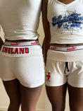 Load image into Gallery viewer, 00's Puma England mini shorts w foldover waist • Size S