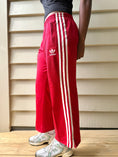 Load image into Gallery viewer, 00's Adidas red 3-stripe track pants *petite • Size M