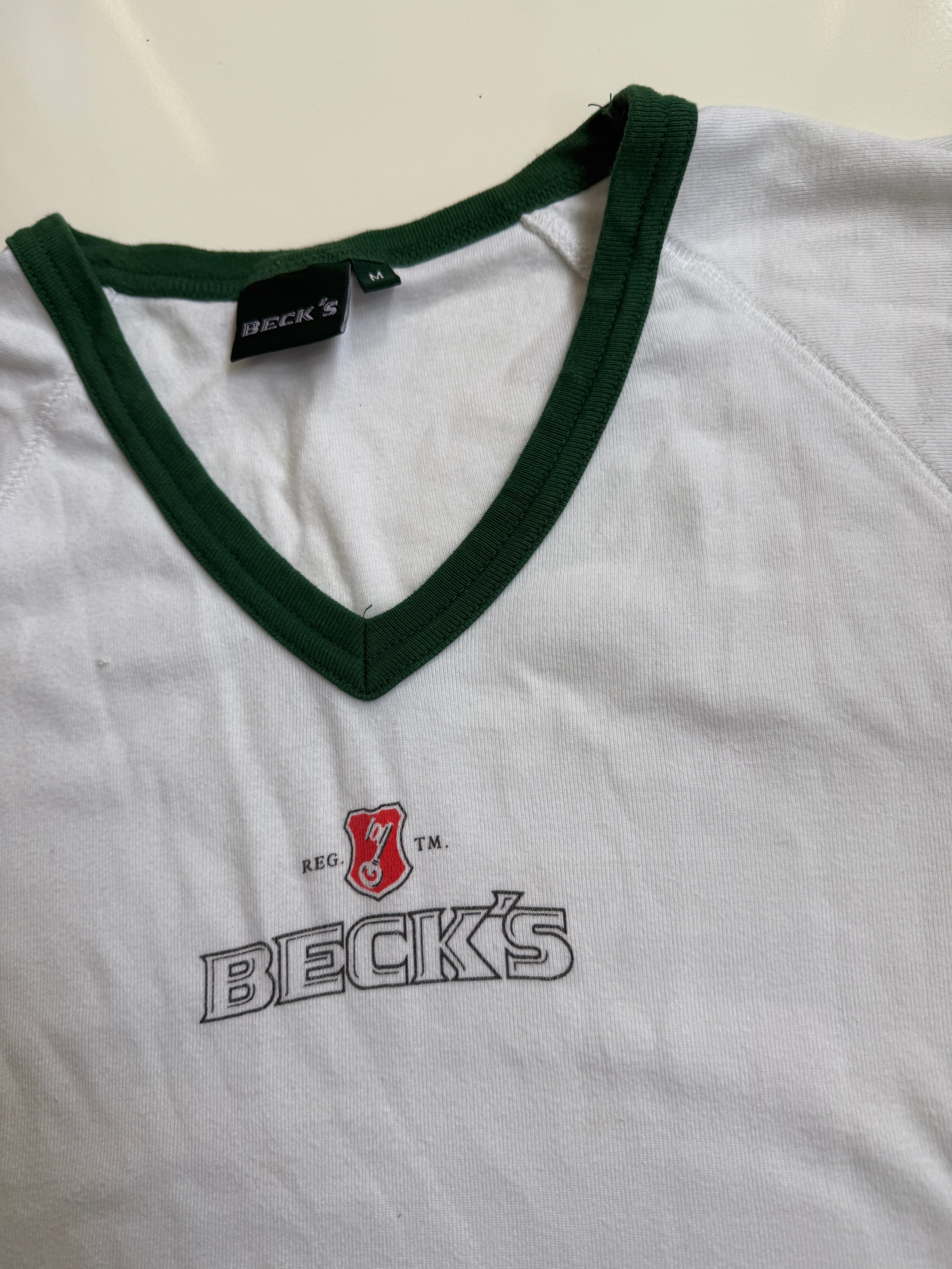 00's Becks cotton baby tee • Size M
