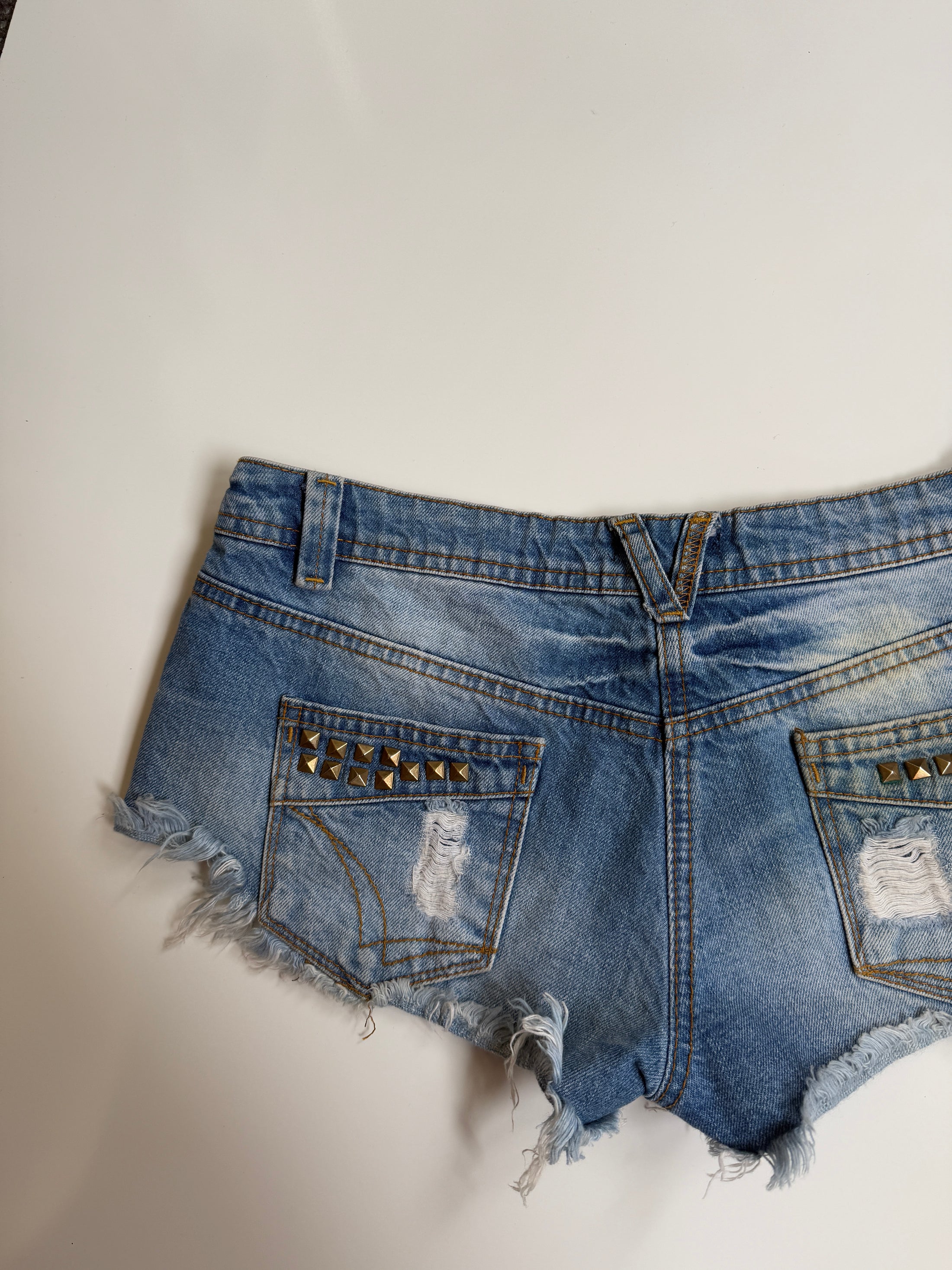 00's Distressed studded micro shorts  • Size 8