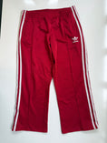 Load image into Gallery viewer, 00's Adidas red 3-stripe track pants *petite • Size M
