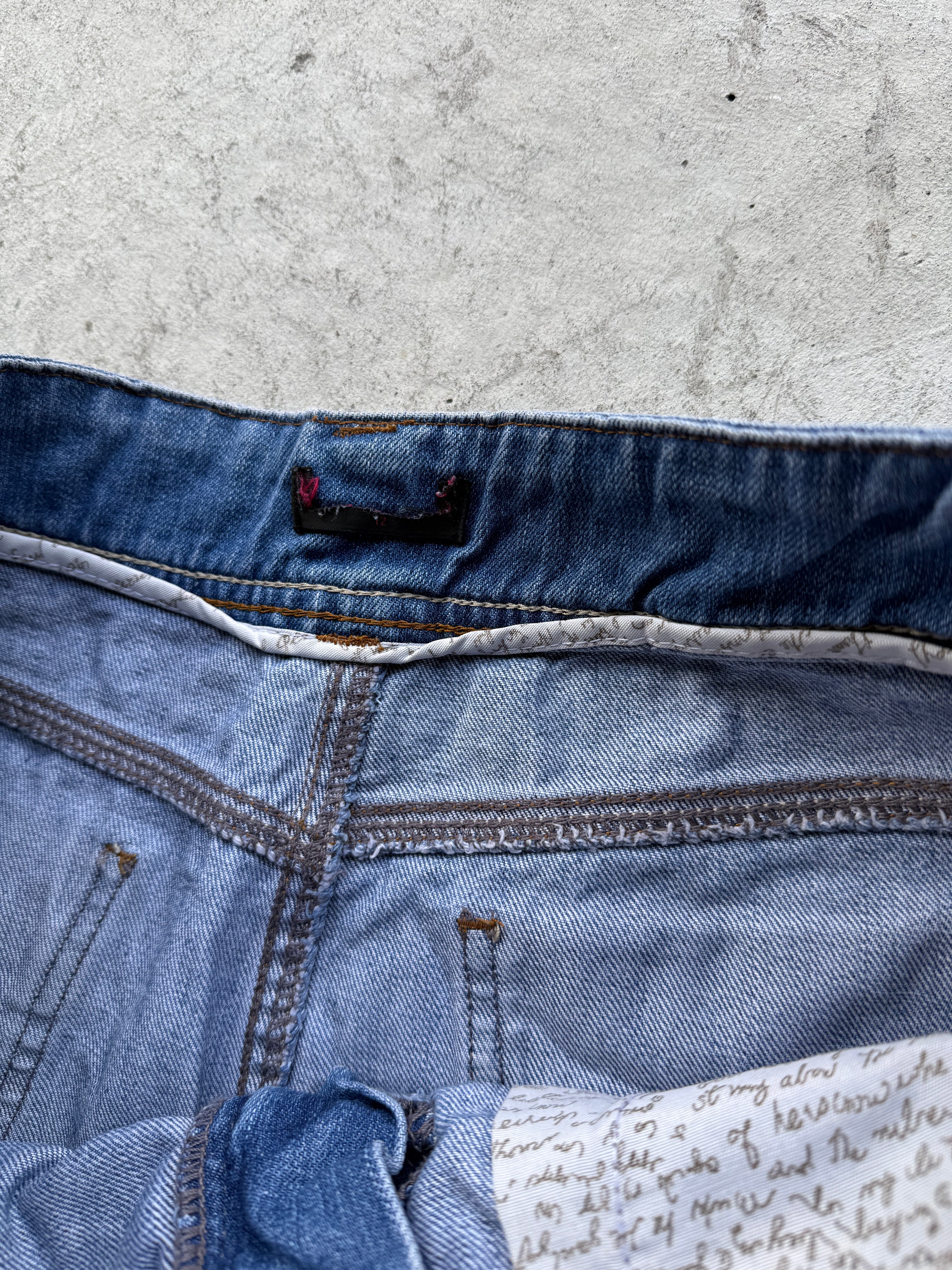 00's Denim distressed micro mini • Size 8