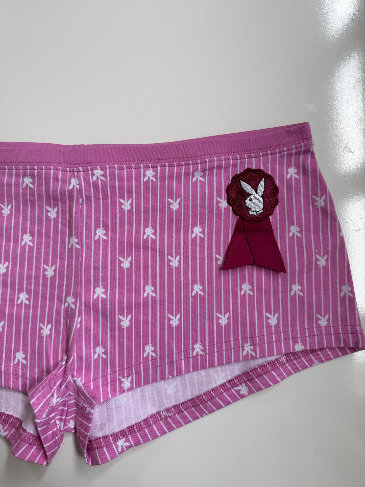 Deadstock 00's Playboy micro shorts • Size L