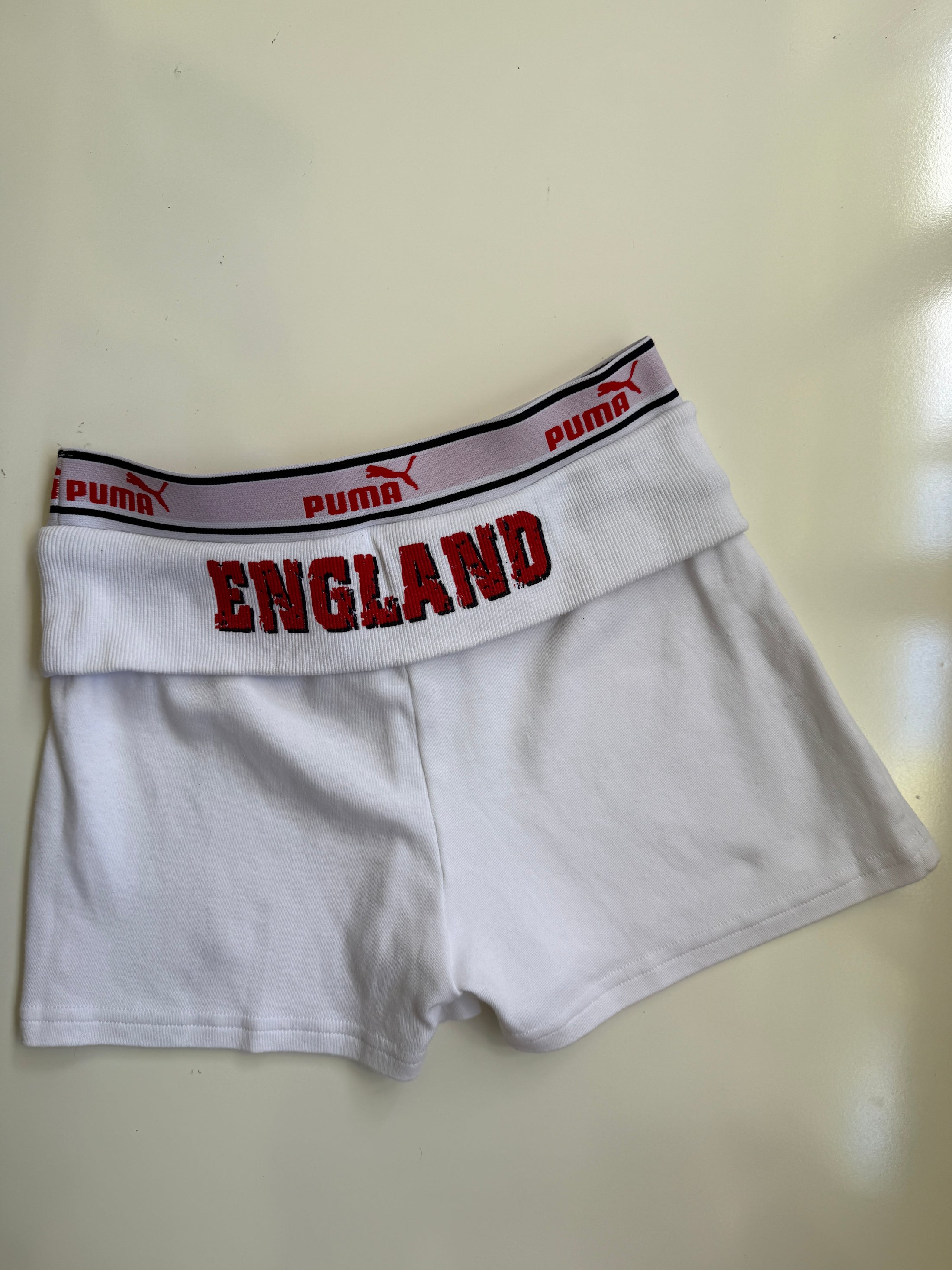 00's Puma England mini shorts w foldover waist • Size S
