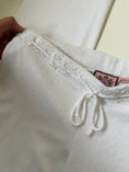 Load image into Gallery viewer, 00's Juicy Couture terrycloth white tracksuit w crochet detail • Size XS-S
