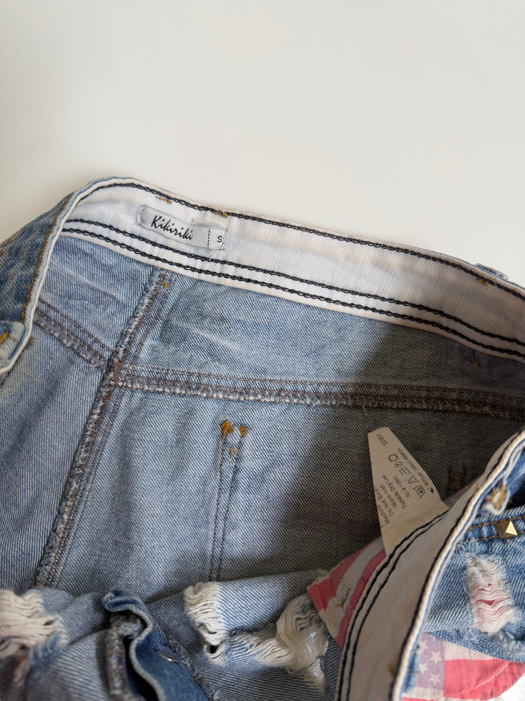 00's Distressed studded micro shorts  • Size 8