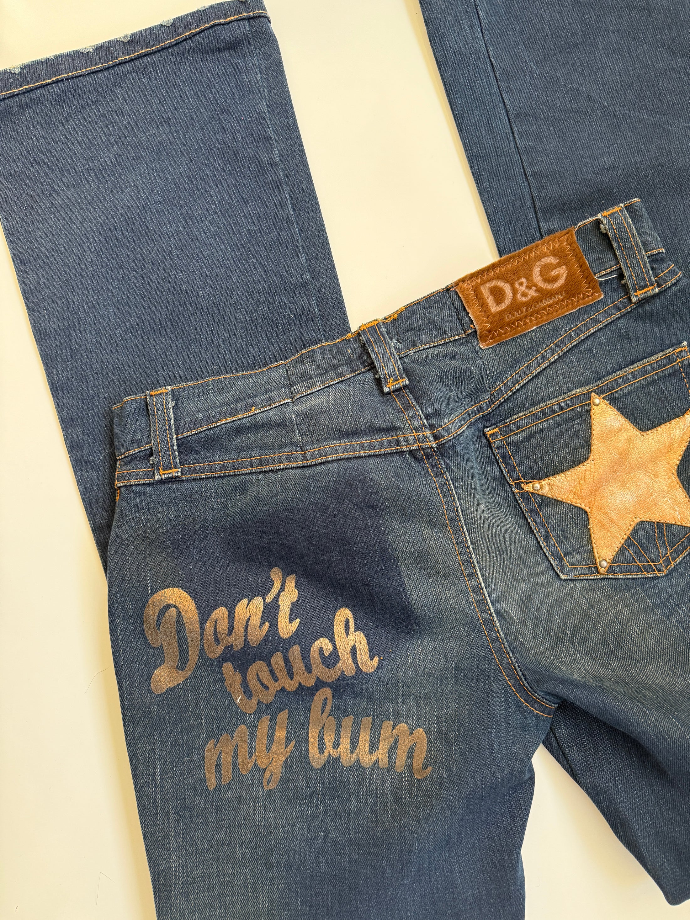 00's Dolce & Gabbana "Don't Touch" low-rise flared jeans• Size 8